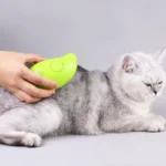 Cepillo de pelo para mascotas con pulverizador eléctrico 3 en 1