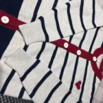 Autumn And Winter New Stripes Color Matching Button Round Neck Knitted Cardigan Women Long-sleeved Sweater All-match photo review
