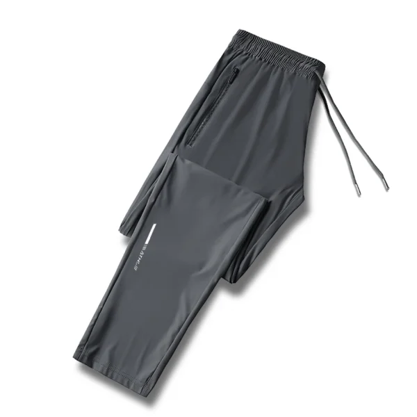 Men's solid color pants summer ice silk elastic quick drying loose sports pants suitable for casual and business wear M-8XL